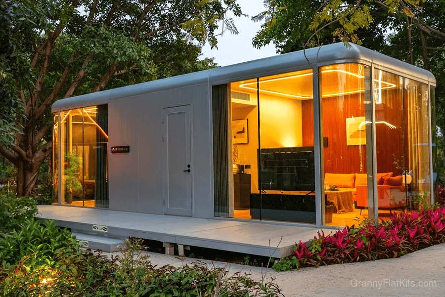 Modular granny flat panoramic exterior showing full-length glass facade