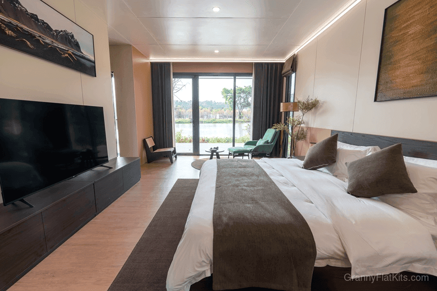 Premium granny flat master bedroom with large windows