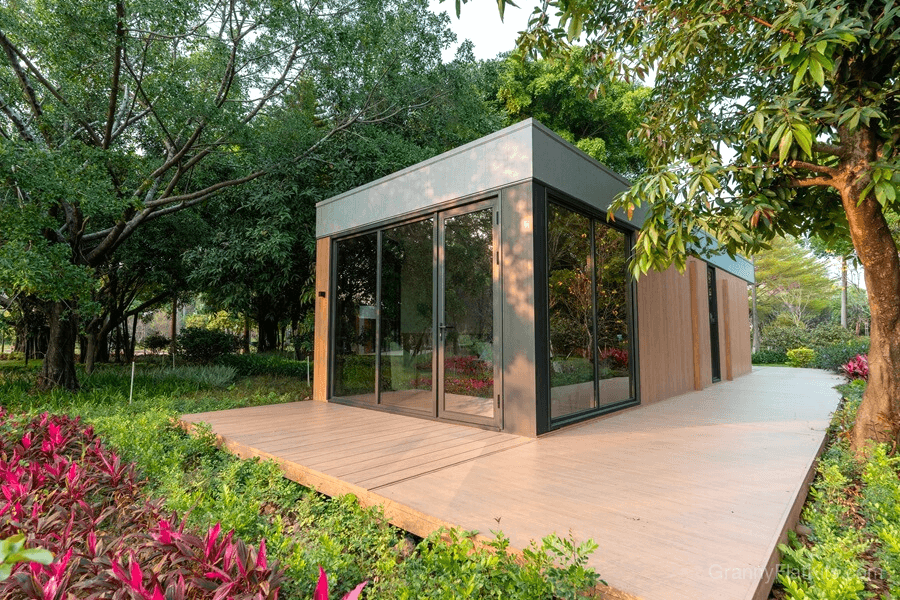 Granny flat kit home showing extended length and glass facade