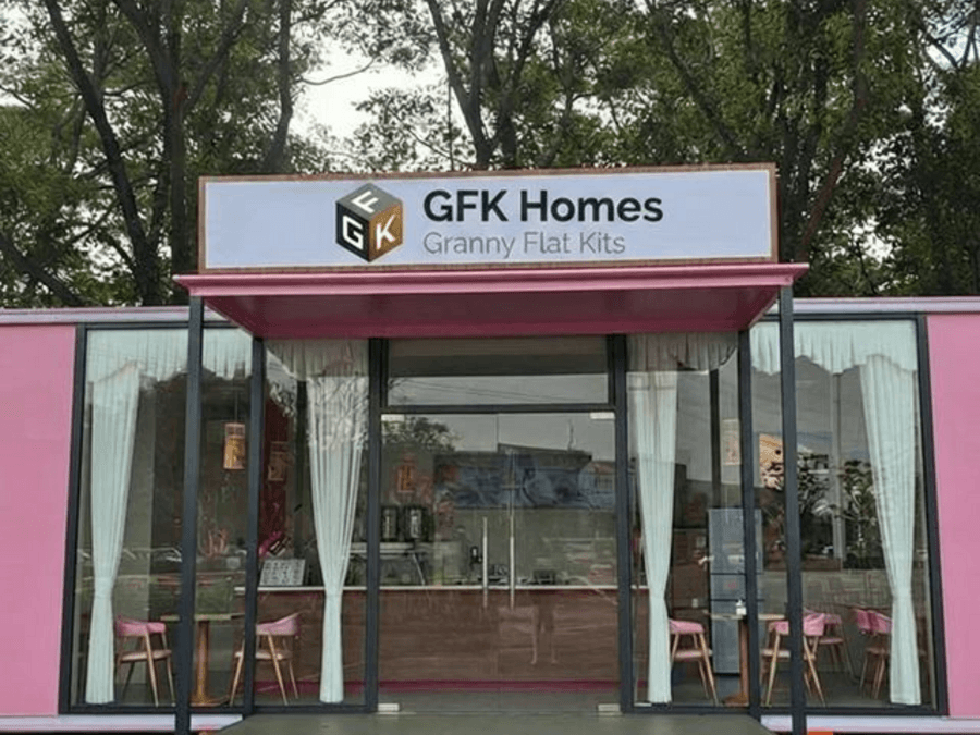 Prefab commercial space exterior with open glass frontage